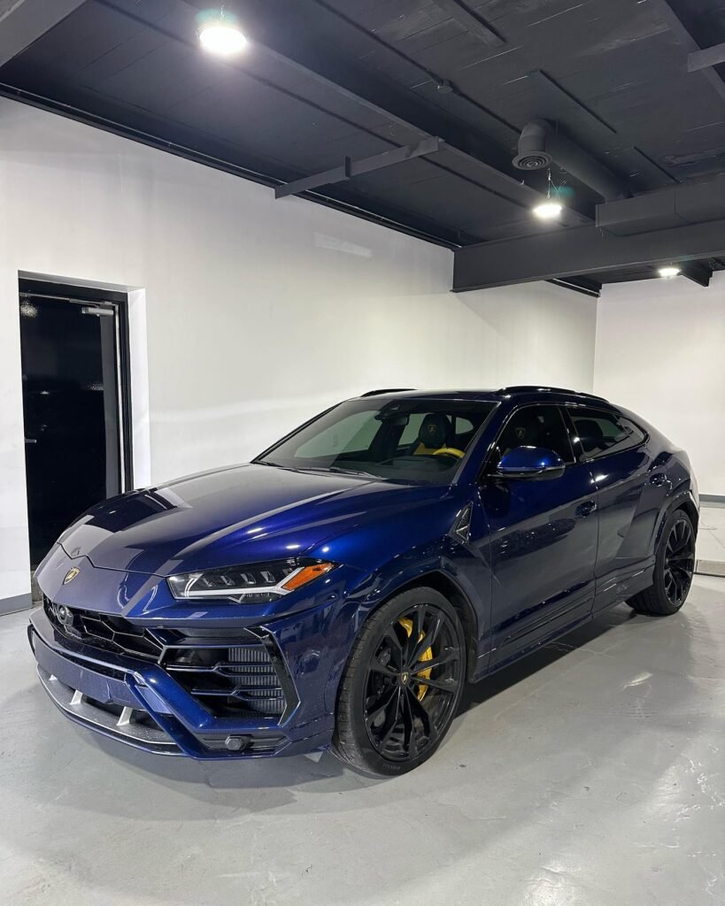 Dark blue Lamborghini Urus in Vinyl Mafia clinton township ppf and tint shop