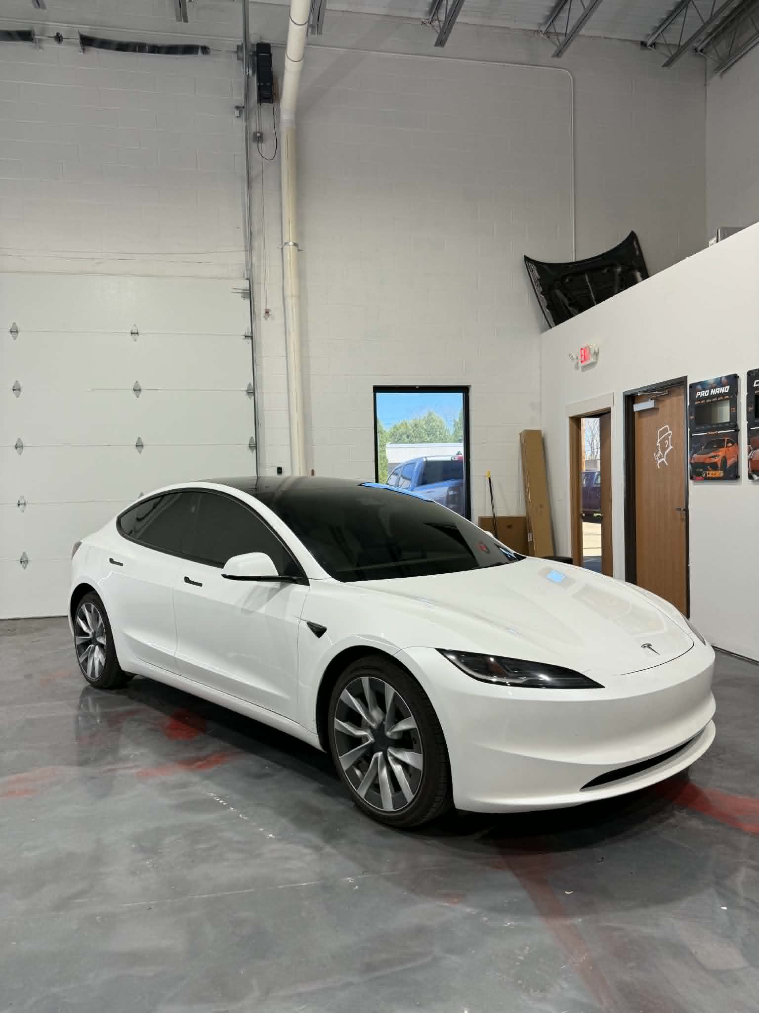 white tesla after window tinting in michigan
