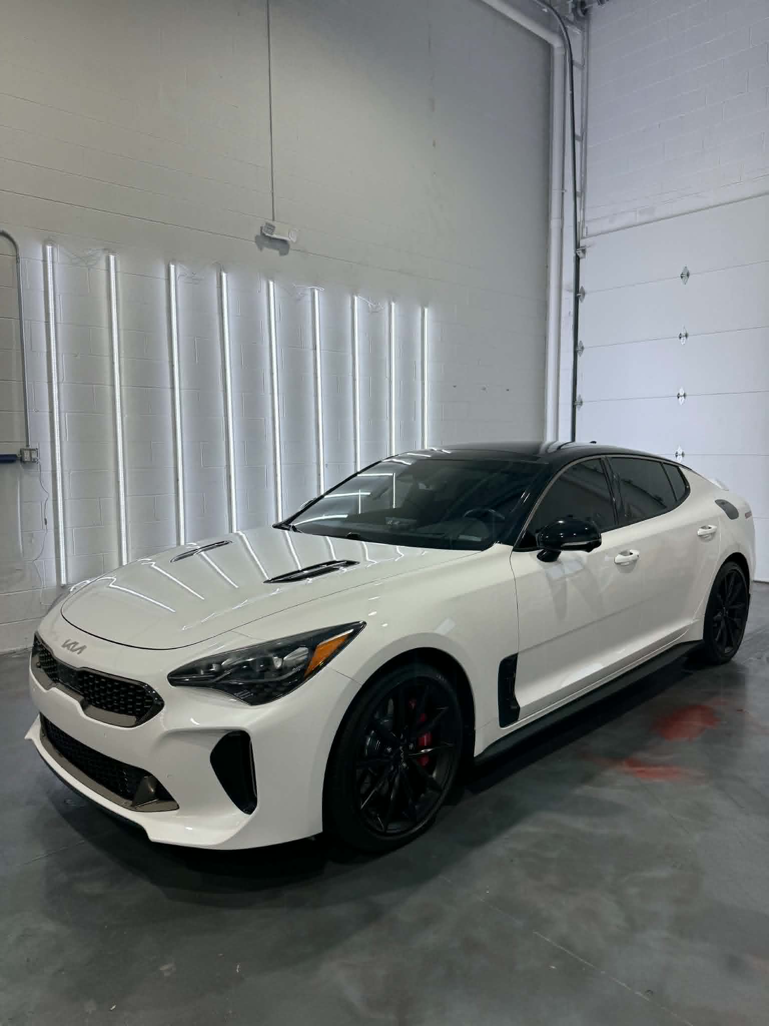 Kia with tinted headlights by Vinyl Mafia