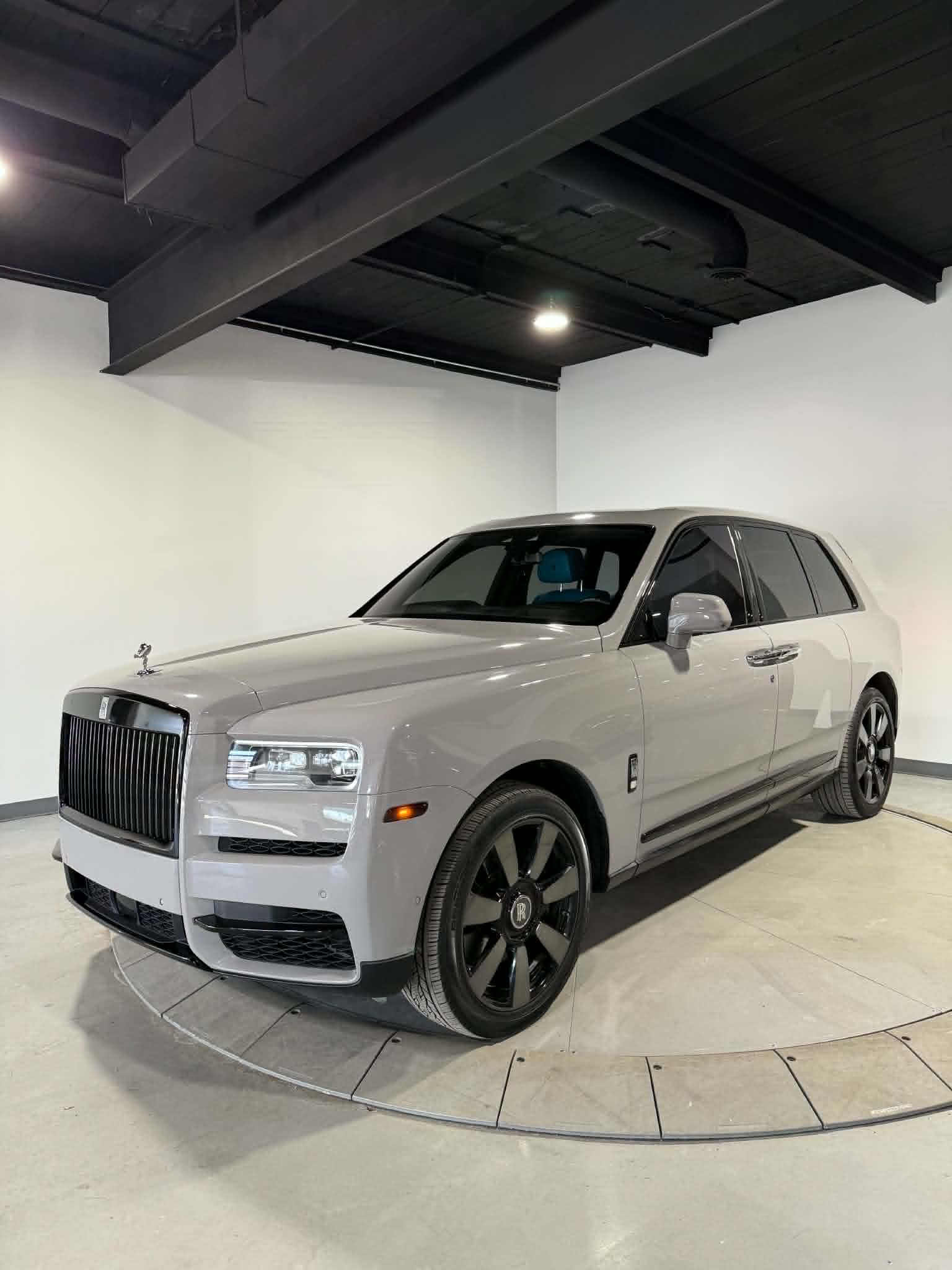 Side angle of Rolls Royce with finished chrome delete installation in Macomb County