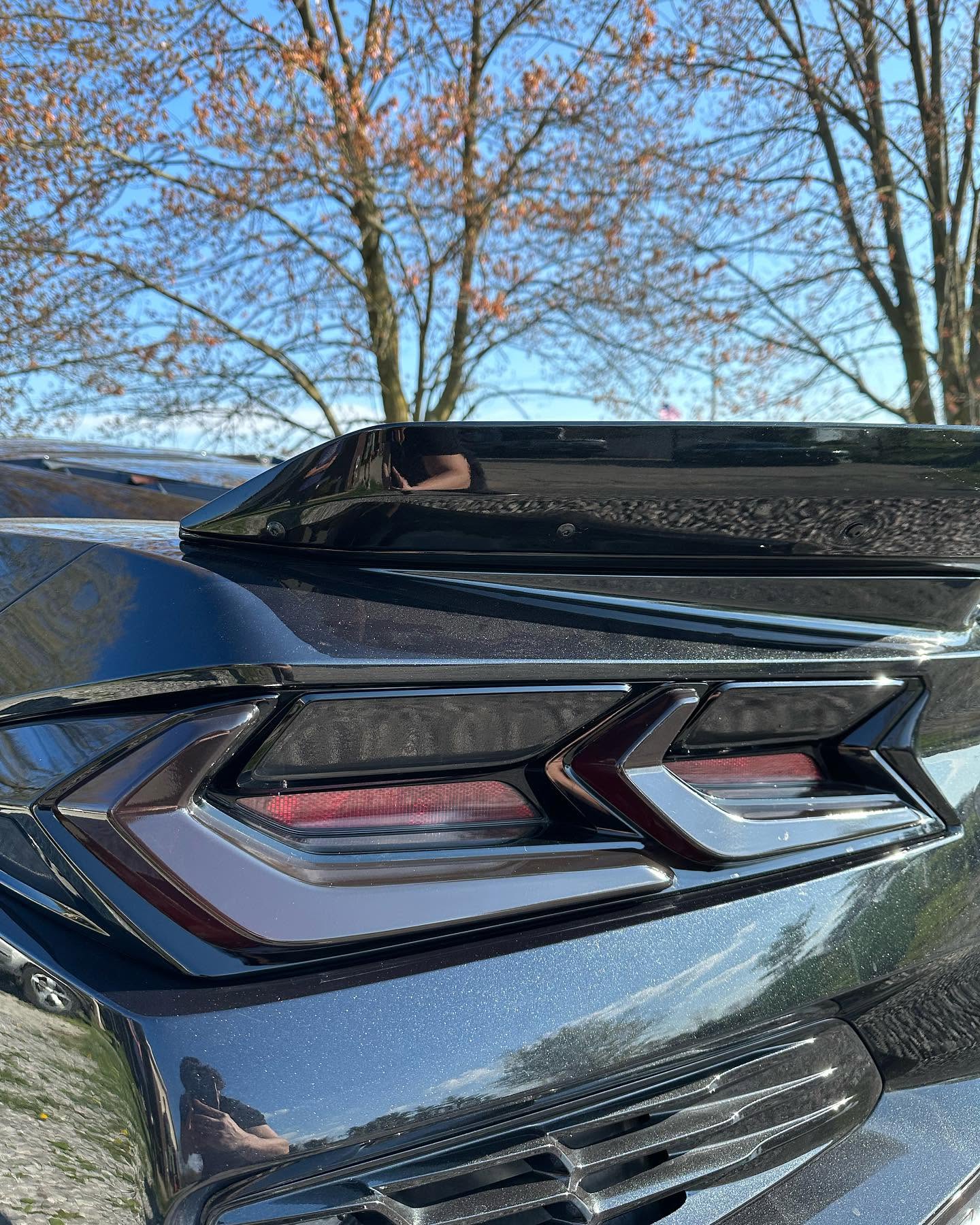 Dark gloss smoke taillight tint on 2024 Corvette Z06 near Clinton Township