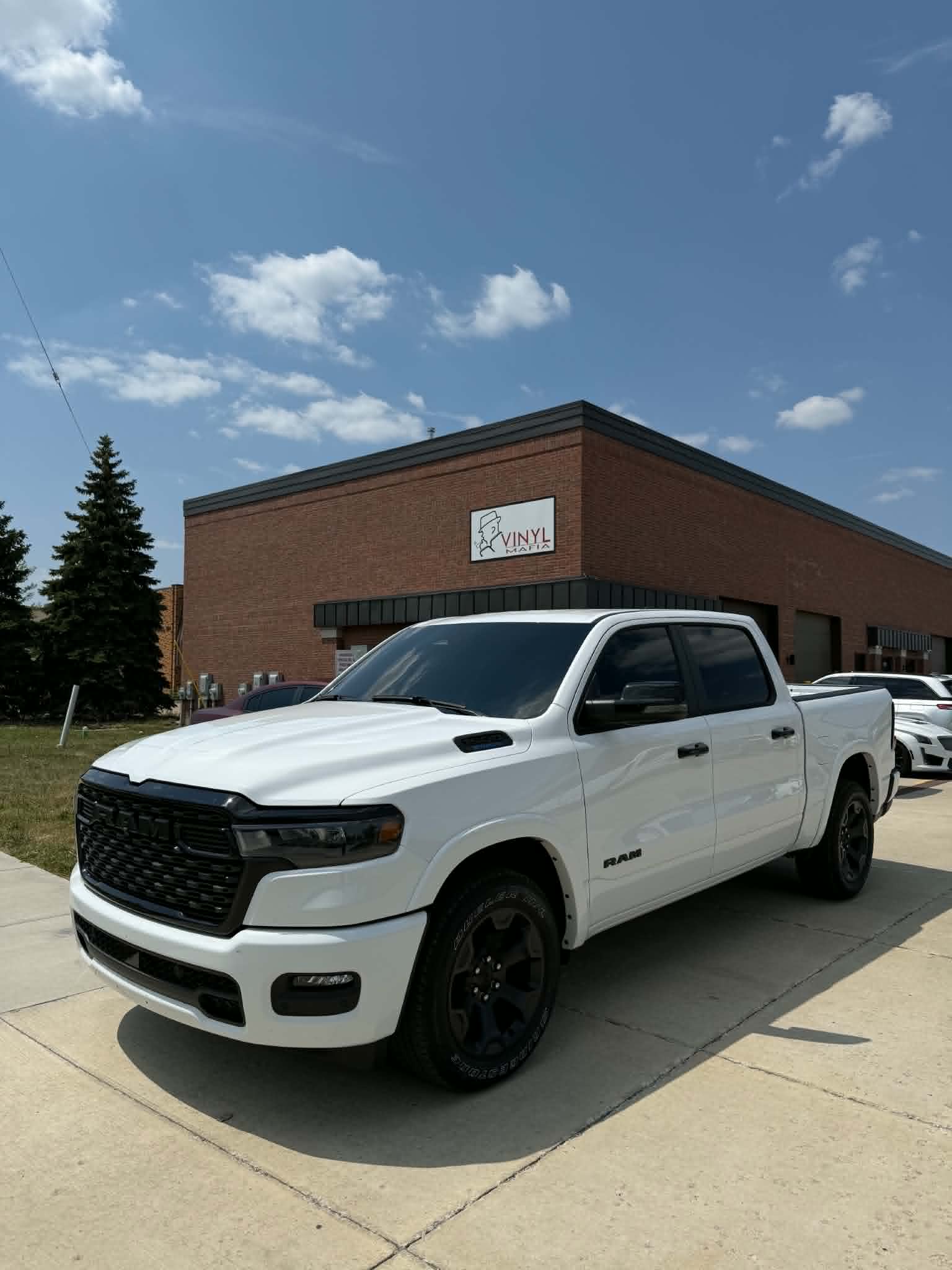 Finished headlight tinting on Ram truck in Fraser