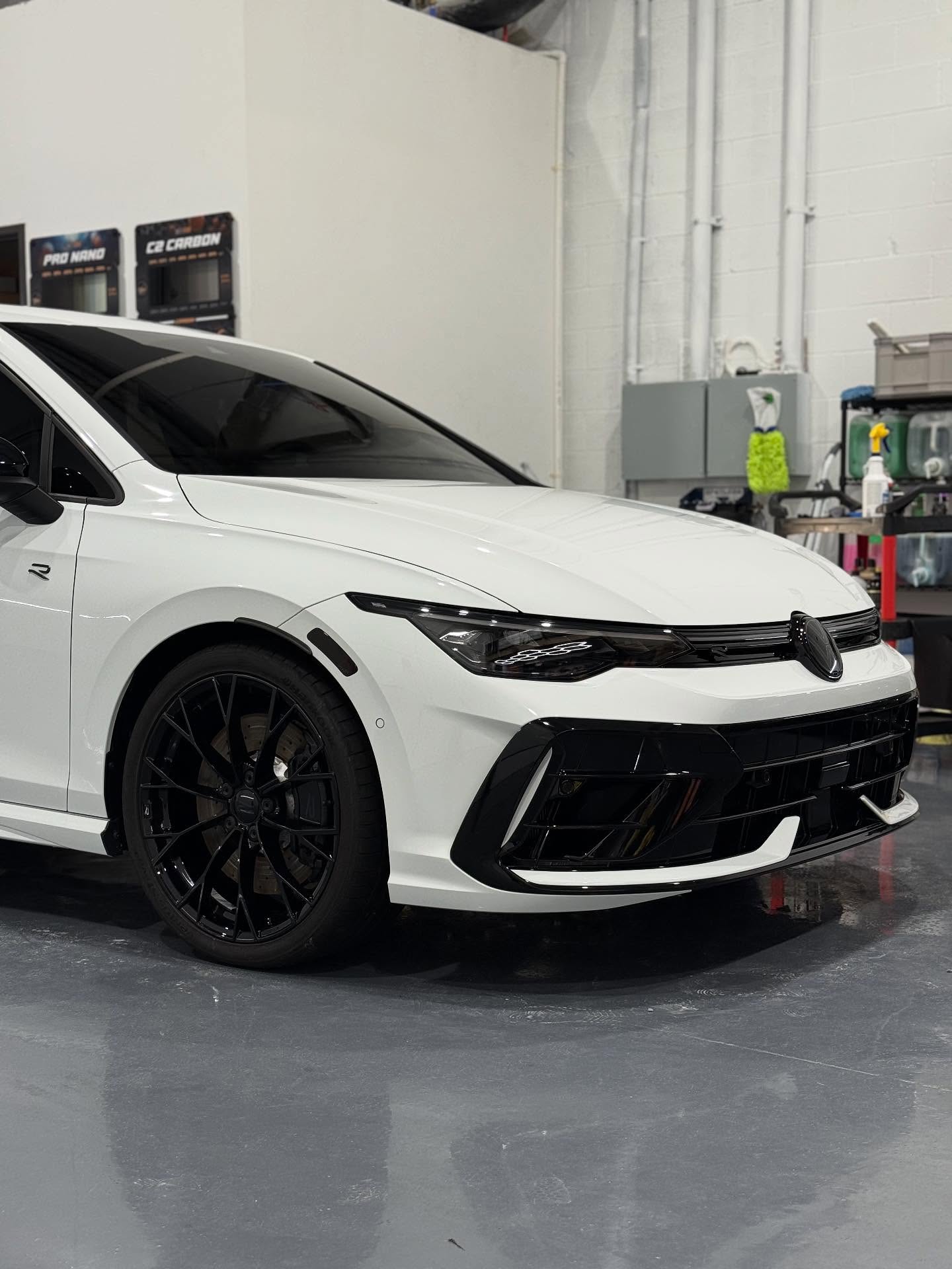 Front of a brand-new VW Golf R after paint correction and ceramic coating in Fraser, MI